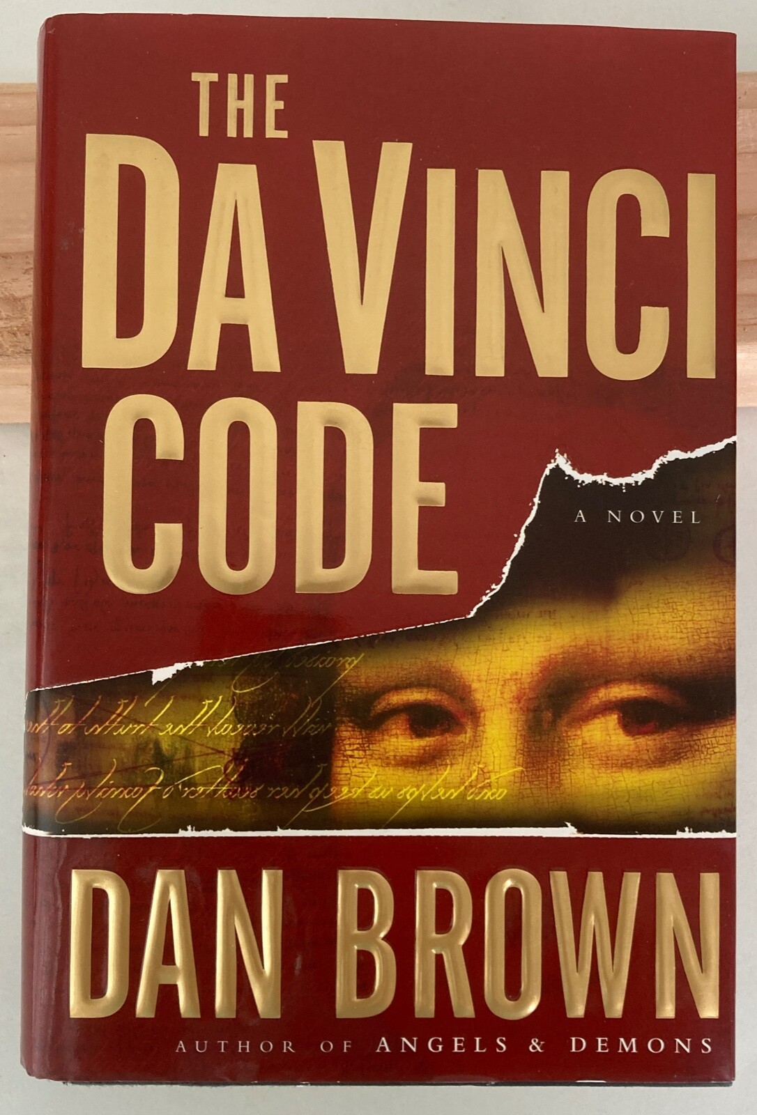 The Da Vinci Code by Dan Brown, Good Condition, 146 pages.