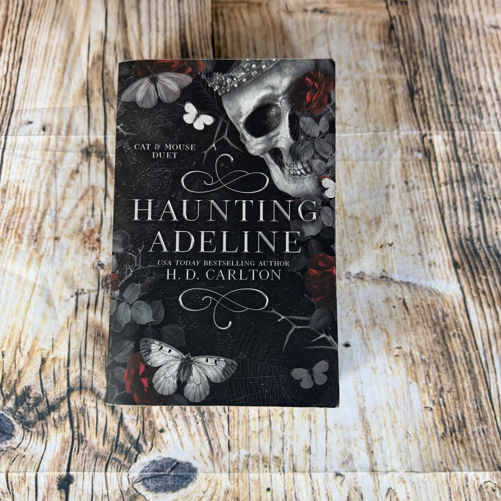 Haunting Adeline by H. D. Carlton