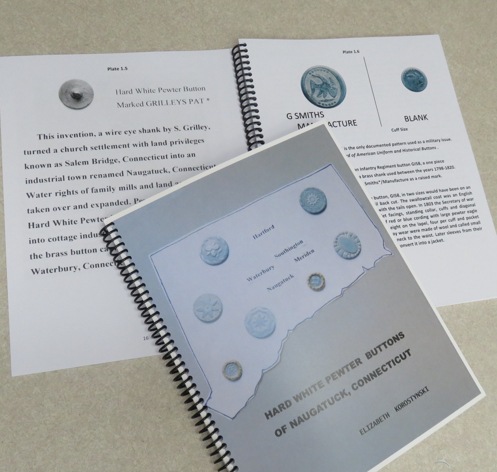HARD WHITE PEWTER BUTTON BOOK