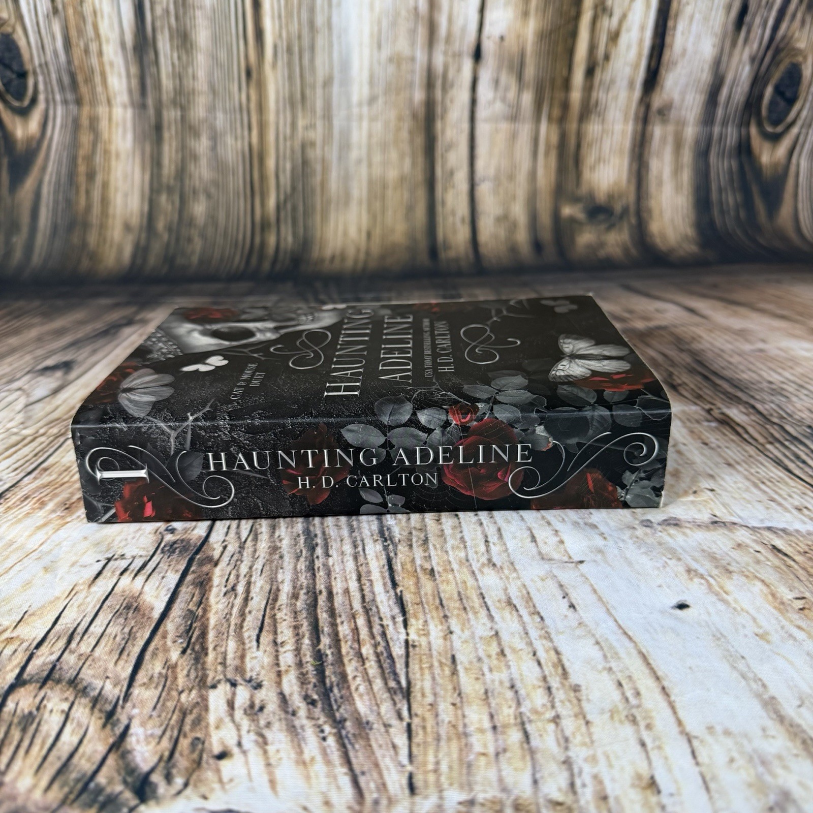 Haunting Adeline by H. D. Carlton