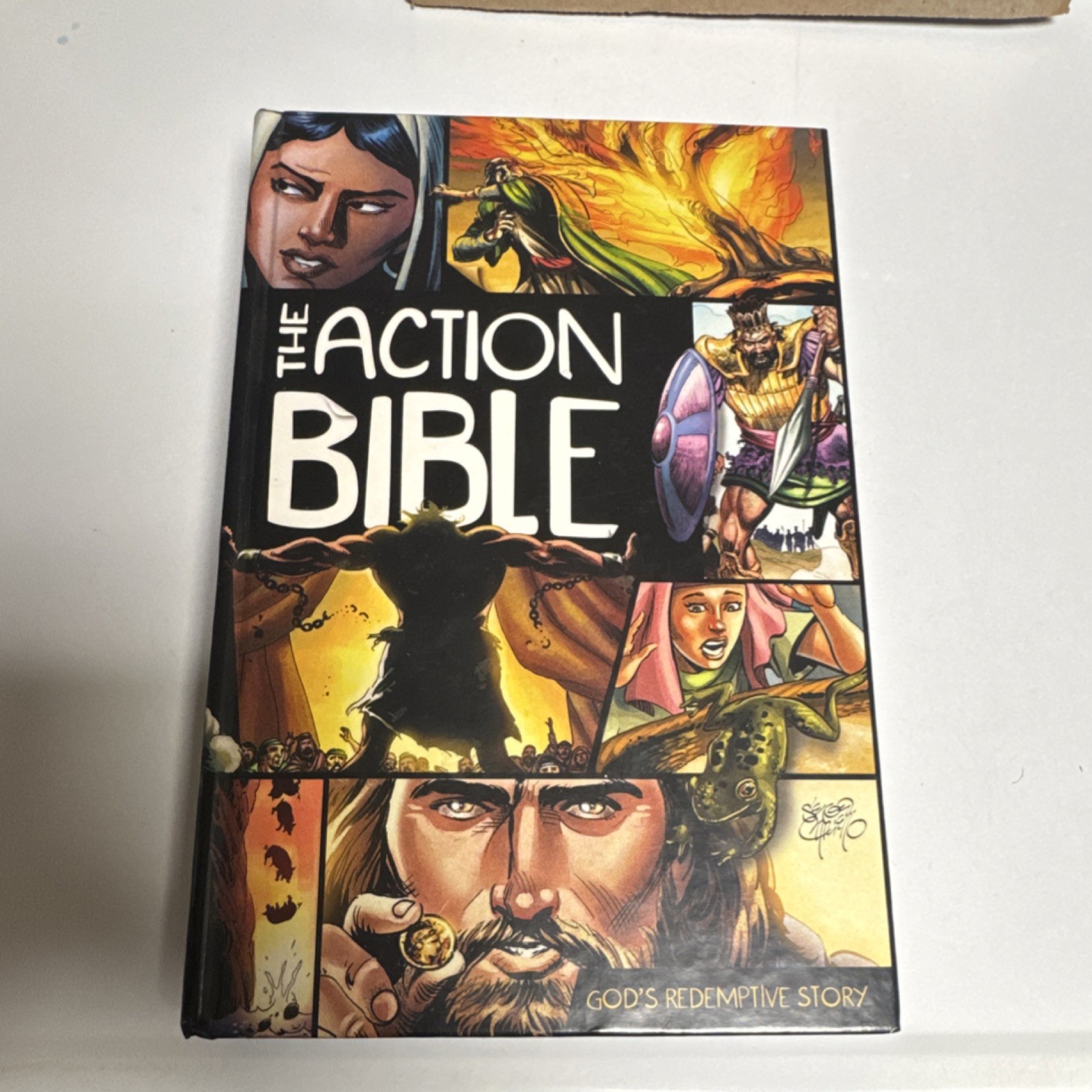 The Action Bible: God’s Redemptive Story by Doug Mauss HC 2010 Illus Cariello